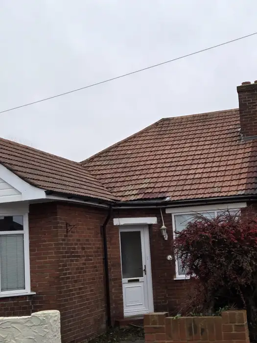 Clean red tile roof on a Kent bungalow